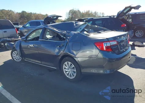 2014 Toyota Camry Le z USA, uszkodzony, nr VIN 4T4BF1FK5ER415032